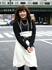 Asian trollop dreams of being a sexual object of lust as she poses for pictures